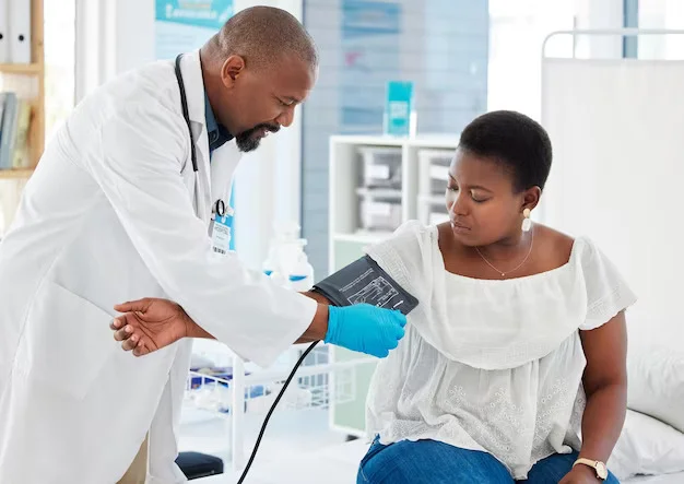 Health insurance 1 helping healthcare doctor with black woman hypertension health check service help medical gp consulting with patient blood pressure exam cardiology monitor 590464 161393